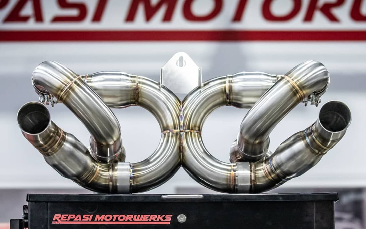 Repasi Motorwerks stainless exhaust system installed on a Porsche Carrera GT